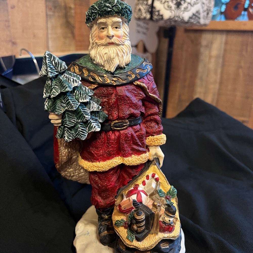 CHRISTMAS SANTA HOLDING SMALL TREE AND TOY BAG RESIN MATERIAL
